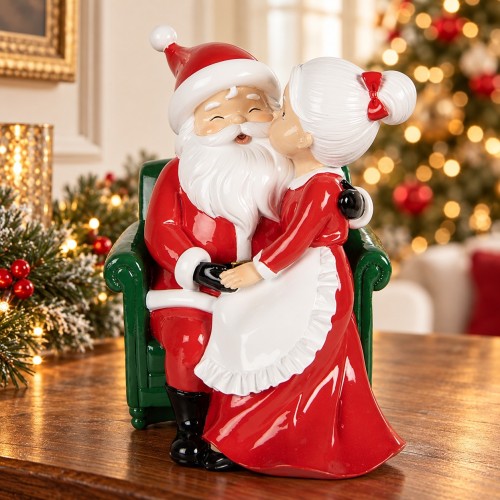 Babbo Natale e Mrs. Claus sulla poltrona 20 cm – ambientazione natalizia